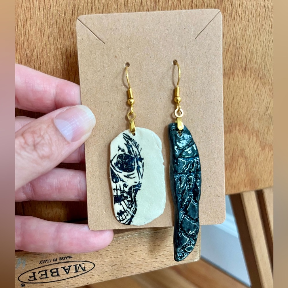 Handmade one-of-a-kind earrings - mismatched skull
Wearable art!